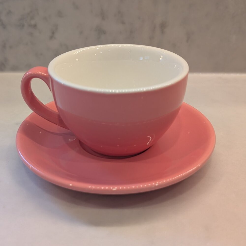 New pink coffee and tea cup with saucer